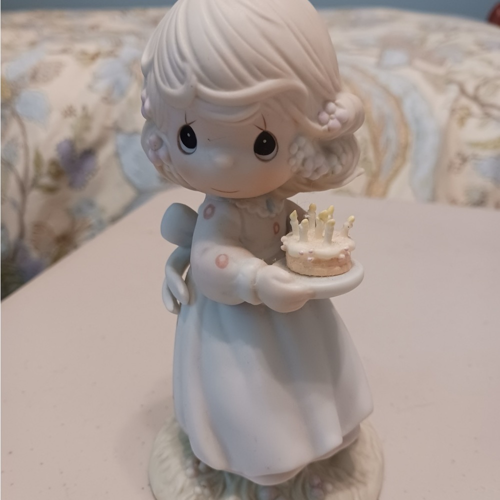 Precious Moments Figurine with White and Pink Accents